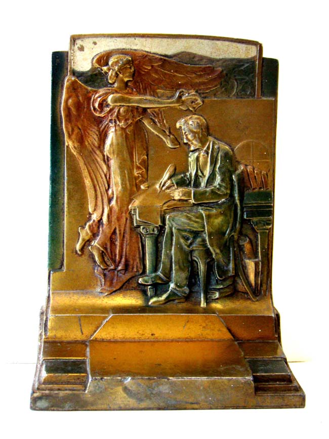 A pair of Antique Bookends entitled "The Emancipator" depicting Abraham Lincoln manufactured in 1925 by the Pompeian Bronze Company.